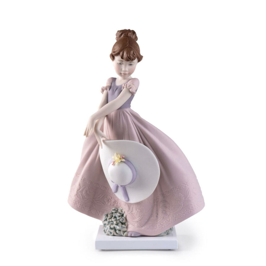 Straw hat in the Wind Girl Figurine